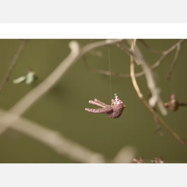 Fredelig due juleophng fra Medusa Copenhagen i polyresin