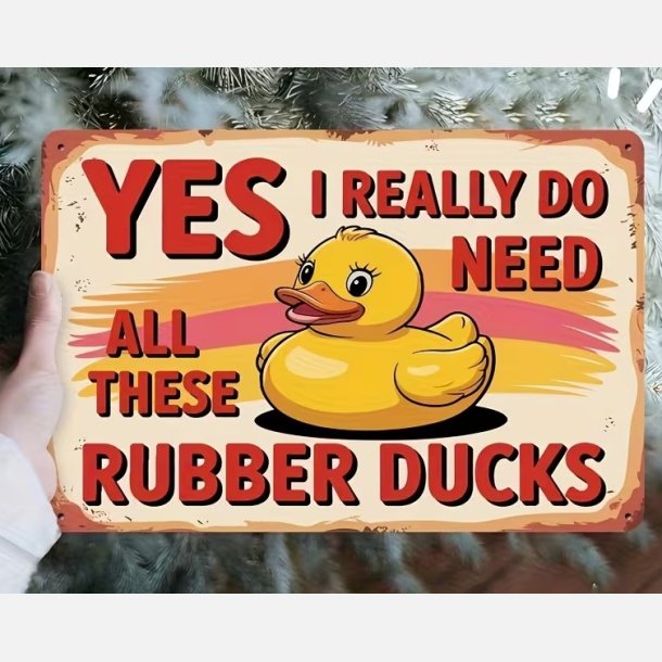 Humoristisk tr�skilt med gummiandmotiv